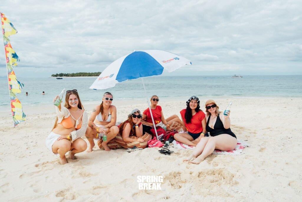 A group photo of crew relaxing at the sandbank party 